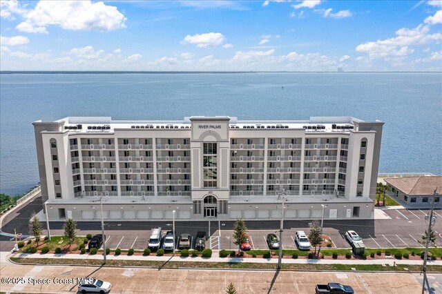 1825 Riverside Dr Unit 205, Titusville, FL 32780 - view of apartment building / complex with a water view