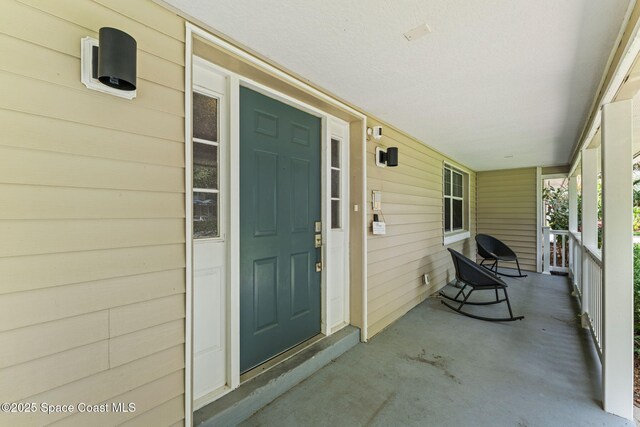 2225 Royal Oaks Dr, Rockledge, FL 32955 - doorway to property with a porch