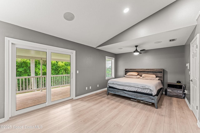 2225 Royal Oaks Dr, Rockledge, FL 32955 - bedroom featuring access to outside, baseboards, vaulted ceiling, and light wood-style flooring