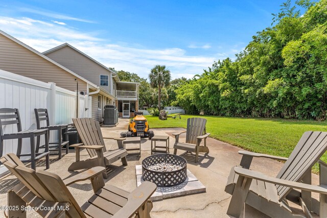 2225 Royal Oaks Dr, Rockledge, FL 32955 - view of patio / terrace featuring a fire pit and cooling unit