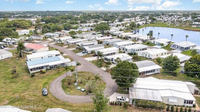 7685 Fox Hunter Cir, Micco, FL 32976 - aerial view of residential area with a large body of water