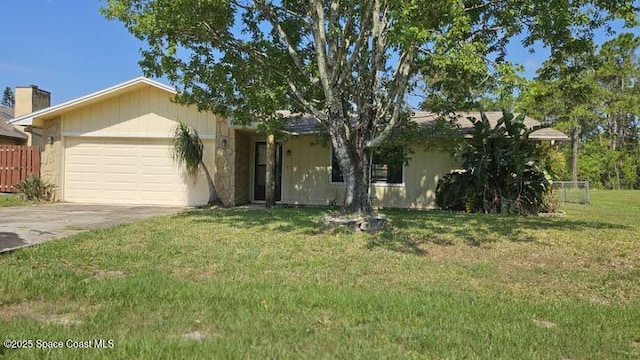 320 Algiers Ave SE, Palm Bay, FL 32909 - ranch-style home featuring an attached garage, concrete driveway, and a chimney