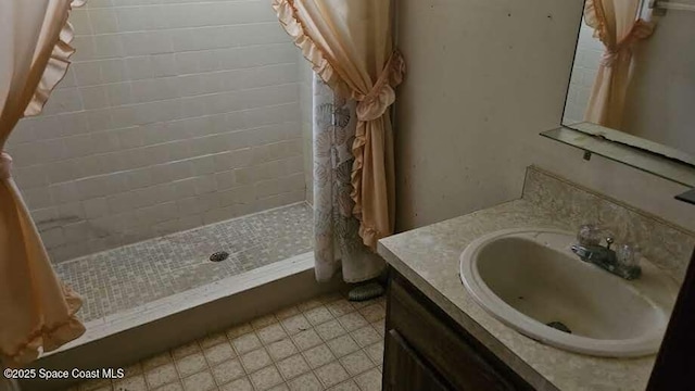 320 Algiers Ave SE, Palm Bay, FL 32909 - full bathroom featuring a shower stall, vanity, and tile patterned flooring