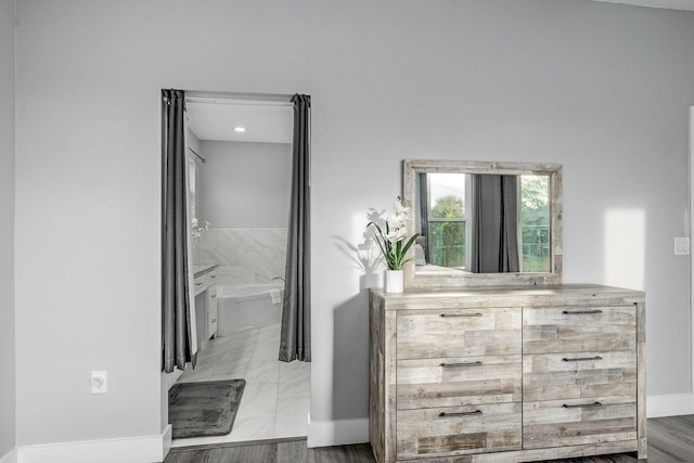 382 Eldron Blvd NE, Palm Bay, FL 32907 - bathroom featuring baseboards and vanity
