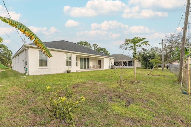 382 Eldron Blvd NE, Palm Bay, FL 32907 - rear view of house featuring stucco siding and a patio