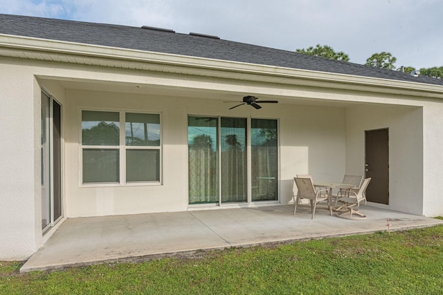 382 Eldron Blvd NE, Palm Bay, FL 32907 - rear view of property featuring ceiling fan, a patio area, and stucco siding