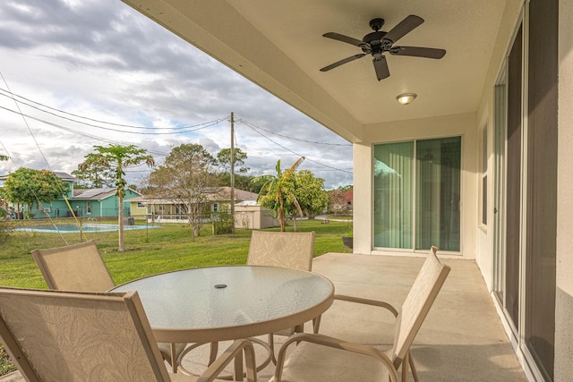 382 Eldron Blvd NE, Palm Bay, FL 32907 - view of patio featuring a ceiling fan and outdoor dining space