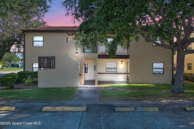 5630 N Banana River Blvd Unit 1, Cocoa Beach, FL 32931 - multi unit property featuring stucco siding and a balcony