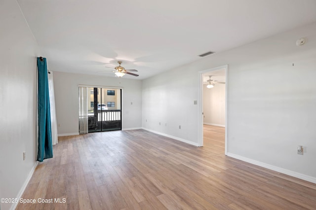 5630 N Banana River Blvd Unit 1, Cocoa Beach, FL 32931 - spare room featuring ceiling fan, light wood-type flooring, baseboards, and a smoke detector