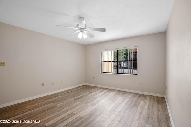 5630 N Banana River Blvd Unit 1, Cocoa Beach, FL 32931 - empty room with light wood finished floors, baseboards, and ceiling fan