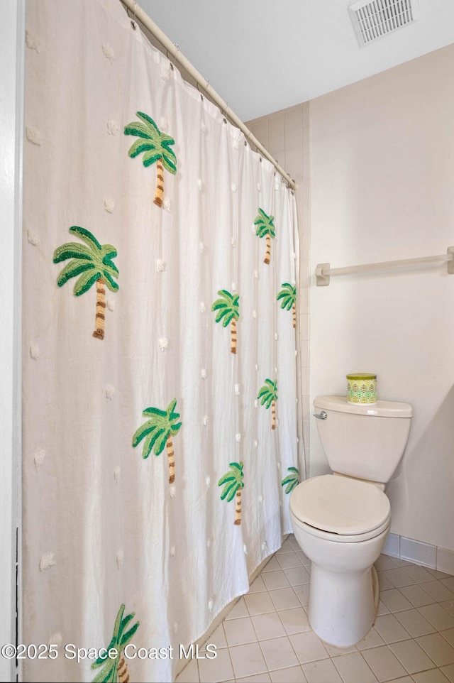 5630 N Banana River Blvd Unit 1, Cocoa Beach, FL 32931 - bathroom with tile patterned flooring and toilet