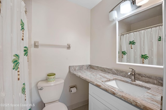 5630 N Banana River Blvd Unit 1, Cocoa Beach, FL 32931 - full bath with toilet, vanity, curtained shower, and tile patterned floors