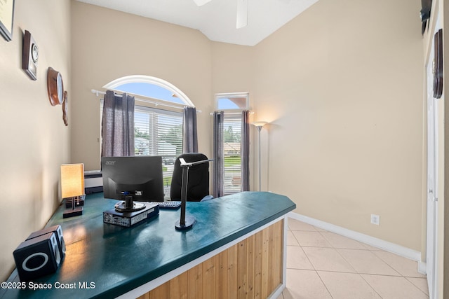 1398 Stuttgart Ave NW, Palm Bay, FL 32907 - office space featuring a ceiling fan, light tile patterned floors, and baseboards