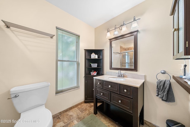1398 Stuttgart Ave NW, Palm Bay, FL 32907 - bathroom with toilet, vanity, stone tile flooring, baseboards, and a shower
