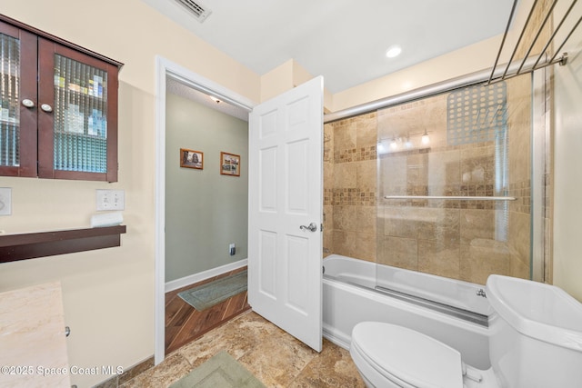 1398 Stuttgart Ave NW, Palm Bay, FL 32907 - bathroom with toilet, combined bath / shower with glass door, and baseboards
