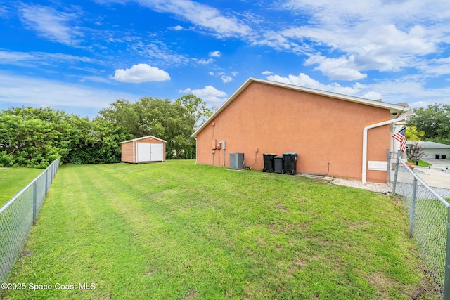 1398 Stuttgart Ave NW, Palm Bay, FL 32907 - view of yard featuring central air condition unit