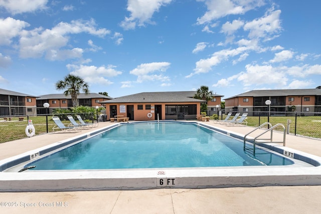 1714 University Ln Unit 201, Cocoa, FL 32922 - community pool featuring a patio and a residential view