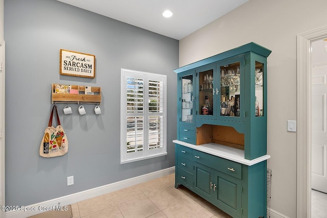 1629 Baseline Ln, Vero Beach, FL 32967 - doorway with light tile patterned flooring and baseboards