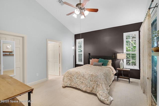 1629 Baseline Ln, Vero Beach, FL 32967 - bedroom featuring high vaulted ceiling, baseboards, light colored carpet, and ceiling fan
