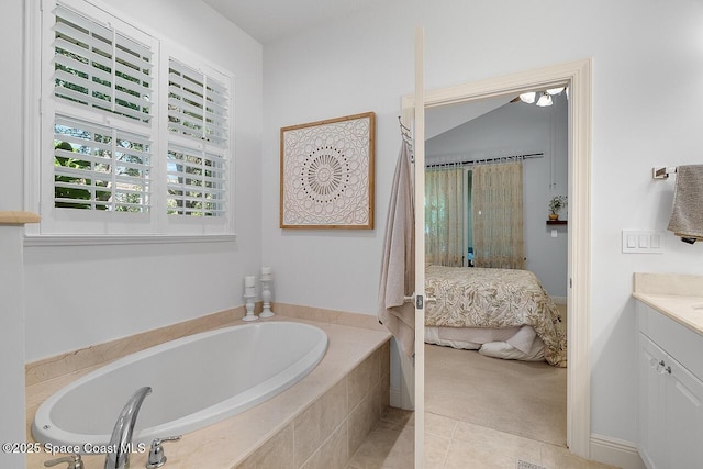 1629 Baseline Ln, Vero Beach, FL 32967 - ensuite bathroom with a garden tub, vanity, and tile patterned floors