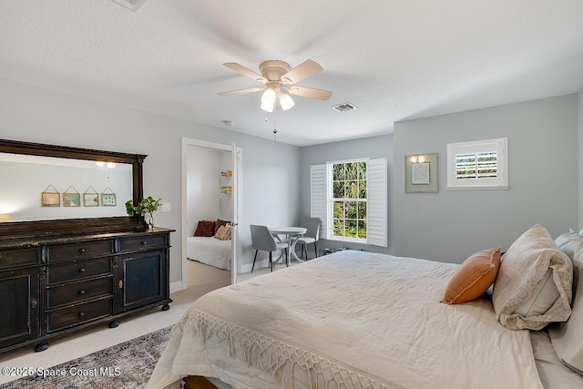 1629 Baseline Ln, Vero Beach, FL 32967 - bedroom with light carpet and a ceiling fan