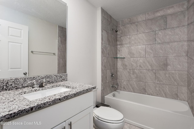 1974 Timbruce Rd SE, Palm Bay, FL 32909 - bathroom featuring toilet, vanity, shower / washtub combination, and a textured ceiling
