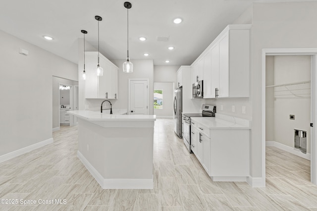 8286 100th Ave, Vero Beach, FL 32967 - kitchen with appliances with stainless steel finishes, white cabinetry, baseboards, and recessed lighting