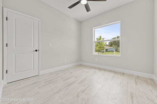 8286 100th Ave, Vero Beach, FL 32967 - spare room featuring ceiling fan and baseboards