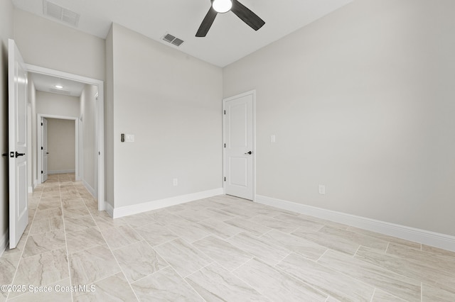 8286 100th Ave, Vero Beach, FL 32967 - spare room with a ceiling fan and baseboards