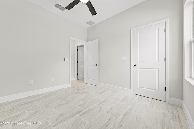 8286 100th Ave, Vero Beach, FL 32967 - unfurnished bedroom with a ceiling fan
