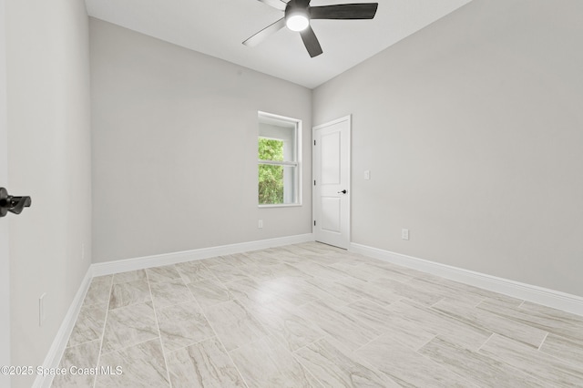 8286 100th Ave, Vero Beach, FL 32967 - empty room featuring ceiling fan and baseboards