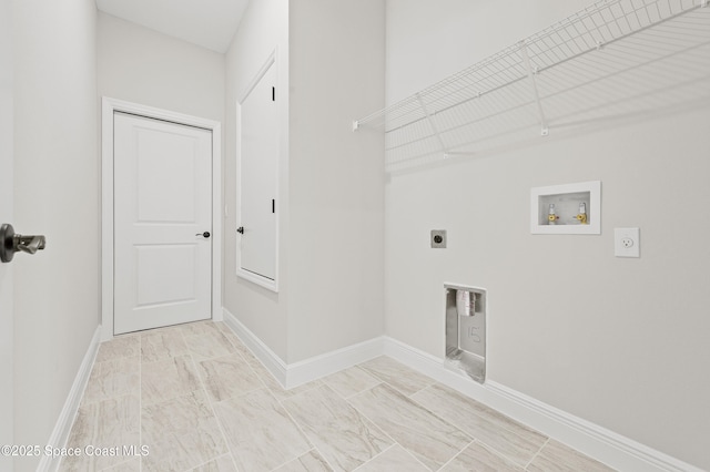 8286 100th Ave, Vero Beach, FL 32967 - washroom with electric dryer hookup, hookup for a washing machine, and baseboards