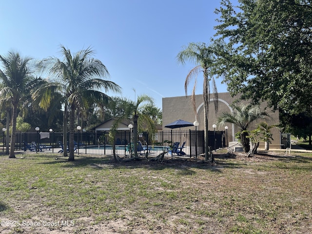 110 Summer Pl Unit 4, Merritt Island, FL 32953 - view of yard featuring a community pool