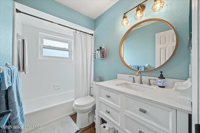 912 Hialeah St, Rockledge, FL 32955 - full bathroom featuring vanity, toilet, shower / tub combo with curtain, and wood finished floors
