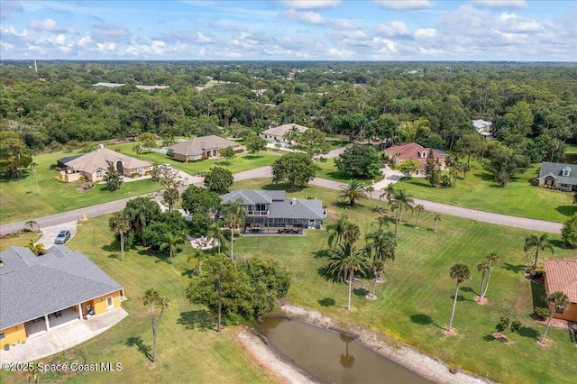 912 Hialeah St, Rockledge, FL 32955 - aerial view of residential area featuring a heavily wooded area