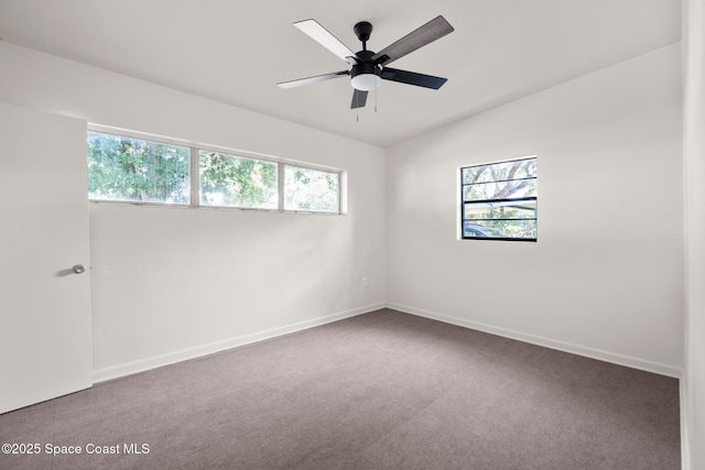 418 N Fiske Blvd, Cocoa, FL 32922 - spare room with carpet flooring, baseboards, and ceiling fan