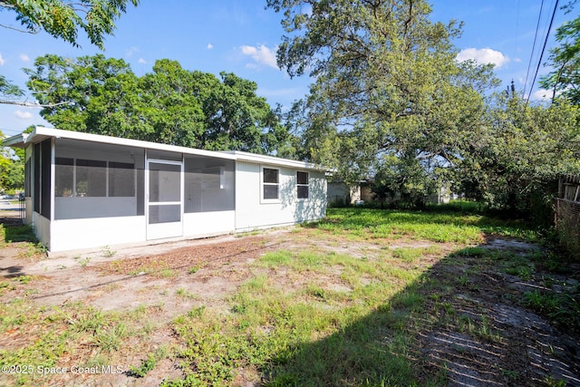 418 N Fiske Blvd, Cocoa, FL 32922 - back of house with a sunroom