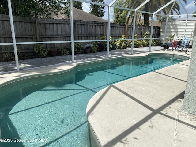 971 Sabal Grove Dr, Rockledge, FL 32955 - view of pool with a patio area, a fenced backyard, and glass enclosure