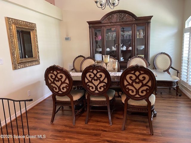 971 Sabal Grove Dr, Rockledge, FL 32955 - dining area with wood finished floors, healthy amount of natural light, and a chandelier