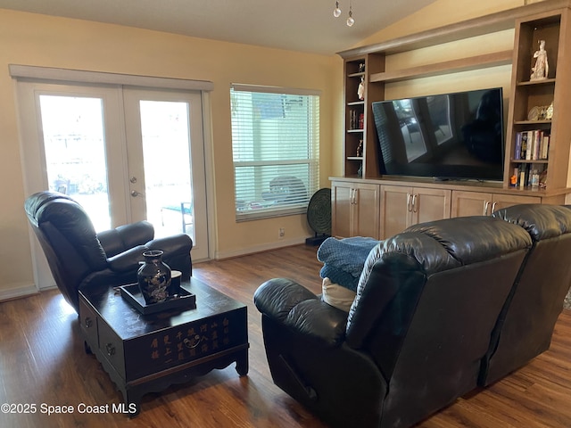 971 Sabal Grove Dr, Rockledge, FL 32955 - living area featuring vaulted ceiling, wood finished floors, and french doors
