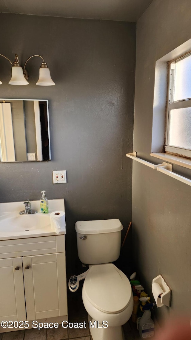 2327 Sadler Ln, Melbourne, FL 32935 - bathroom with toilet and vanity