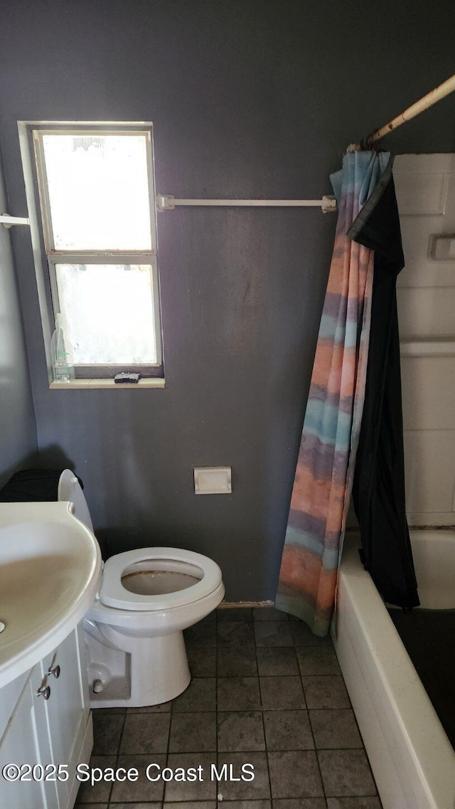 2327 Sadler Ln, Melbourne, FL 32935 - full bathroom with toilet, shower / tub combo, tile patterned floors, and vanity