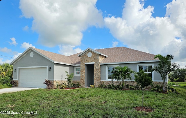 571 Fondulac St, Palm Bay, FL 32908 - single story home with stone siding, a garage, a front yard, and concrete driveway