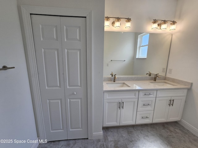 571 Fondulac St, Palm Bay, FL 32908 - bathroom featuring a closet and double vanity
