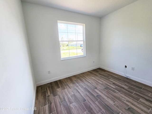 571 Fondulac St, Palm Bay, FL 32908 - empty room featuring dark wood finished floors and baseboards