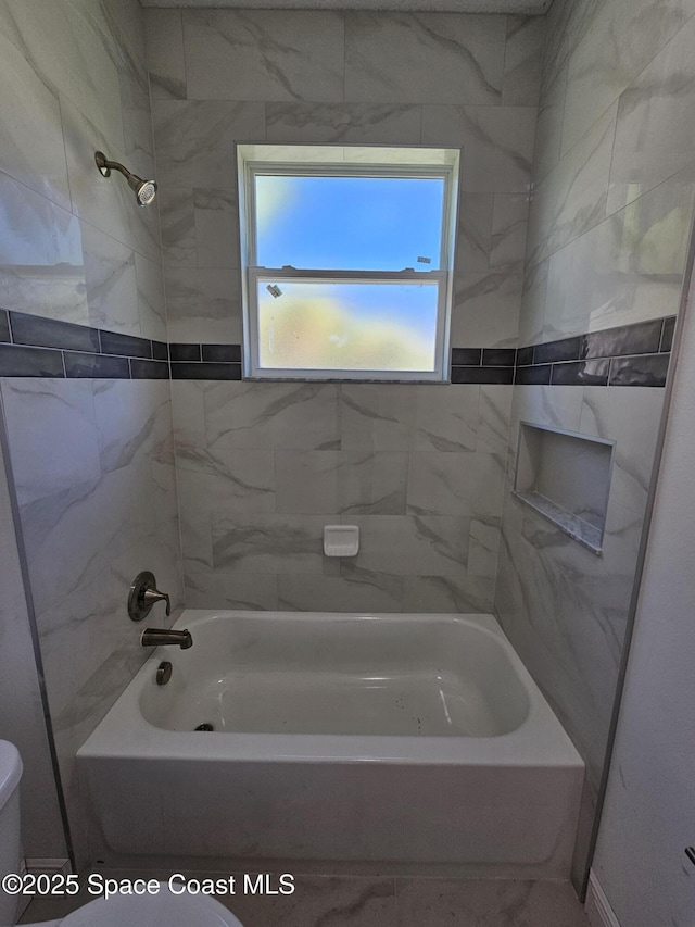 571 Fondulac St, Palm Bay, FL 32908 - bathroom with toilet and washtub / shower combination