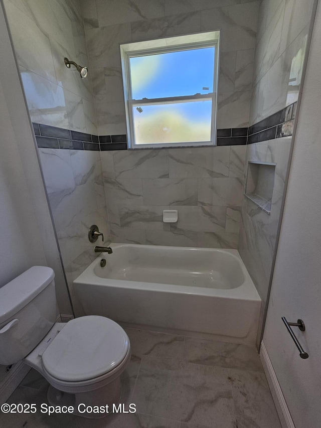 571 Fondulac St, Palm Bay, FL 32908 - bathroom featuring bathtub / shower combination and marble finish floors