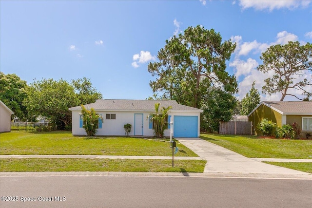 933 Gueld Ave NE, Palm Bay, FL 32905 - ranch-style house with a garage and driveway