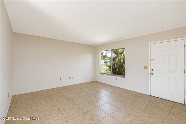 933 Gueld Ave NE, Palm Bay, FL 32905 - spare room with light tile patterned flooring