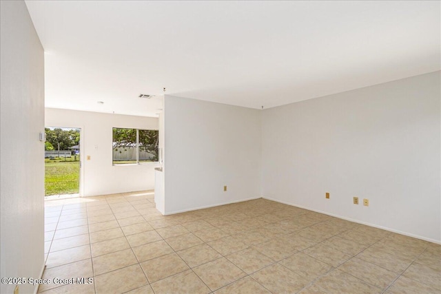 933 Gueld Ave NE, Palm Bay, FL 32905 - empty room with light tile patterned flooring